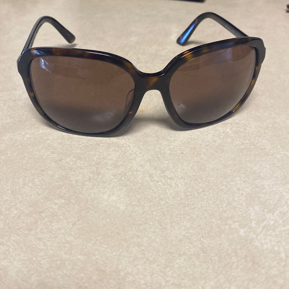 Prada sunglasses tortious